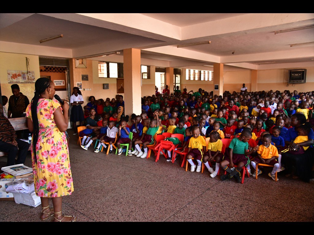 Sister Esther from Dunamis radio sharing the love of Jesus with students in the Makindye School